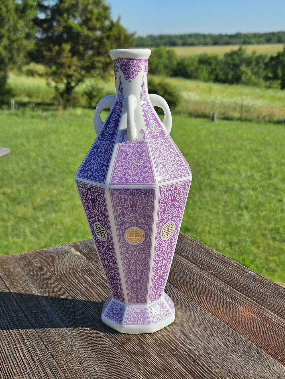 Chinese porcelain vase with purple and white floral and geometric patterns with